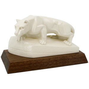 ivory colored Nittany Lion Shrine on walnut base